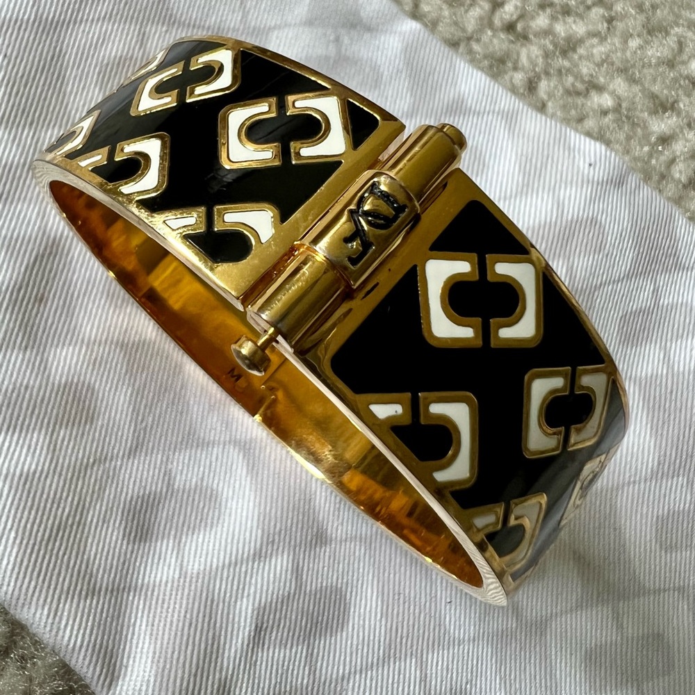 DVF Black and gold cuff bracelet.